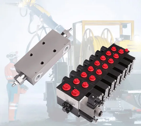 A proportional directional spool and a counterbalance valve on display, with tunnel equipment in the background.